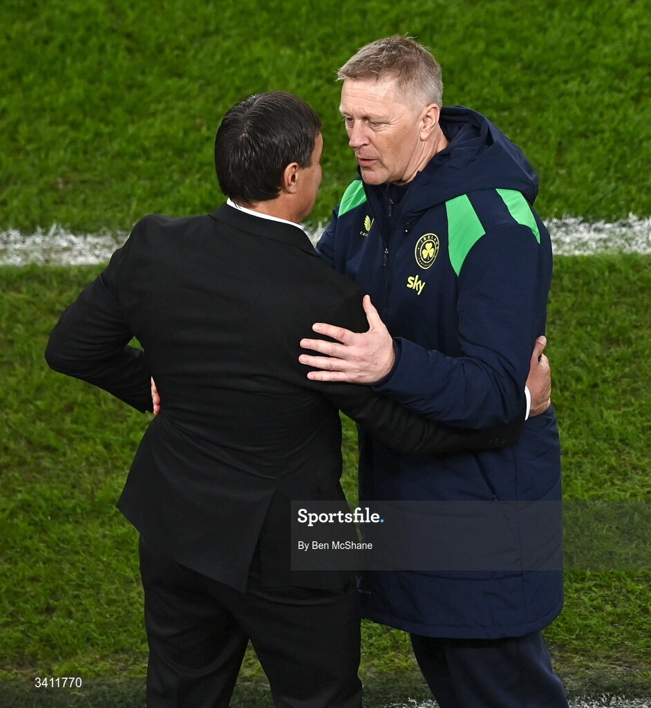 31 March 2026; Republic of Ireland head coach Heimir Hallgrimsson, right, and North Macedonia head coach Goce Sedloski after the international friendly match between Republic of Ireland and North Macedonia at Aviva Stadium in Dublin. Photo by Ben McShane/Sportsfile