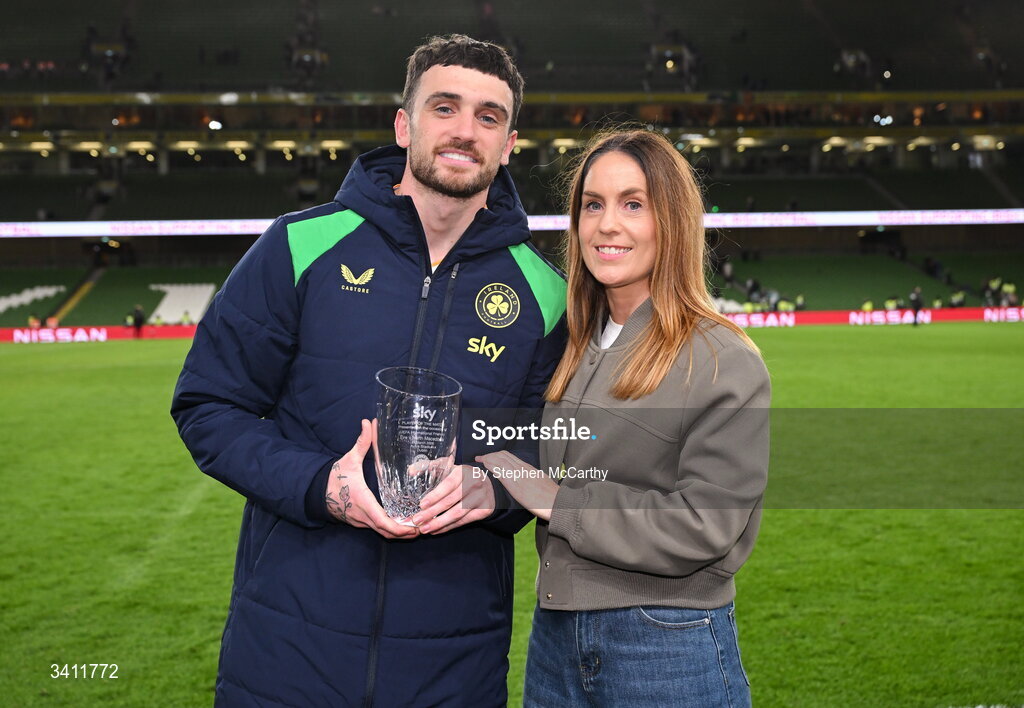 31 March 2026; Troy Parrott of Republic of Ireland is presented with the Sky Player of the Match Award by director of marketing and brand at Sky Ireland Caroline Donnellan after the international friendly match between Republic of Ireland and North Macedonia at Aviva Stadium in Dublin. Photo by Stephen McCarthy/Sportsfile