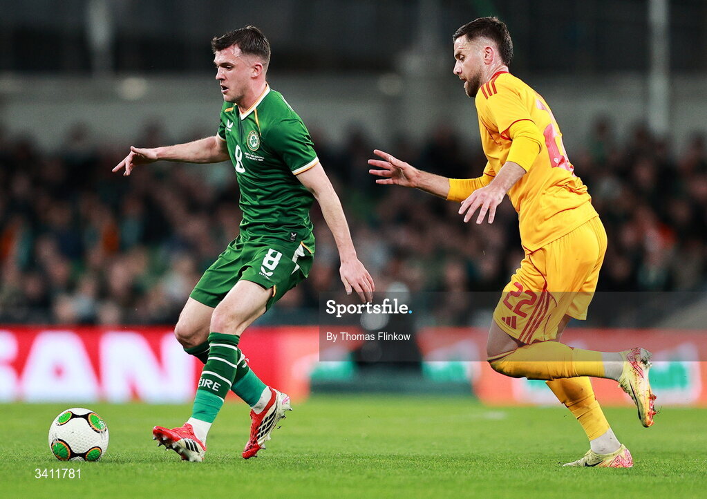 31 March 2026; Jason Knight of Republic of Ireland in action against Isnik Alimi of North Macedonia during the international friendly match between Republic of Ireland and North Macedonia at Aviva Stadium in Dublin. Photo by Thomas Flinkow/Sportsfile