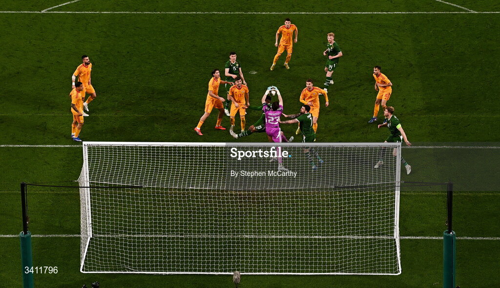 31 March 2026; North Macedonia goalkeeper Stole Dimitrievski gathers possession ahead of Chiedozie Ogbene and Troy Parrott of Republic of Ireland during the international friendly match between Republic of Ireland and North Macedonia at Aviva Stadium in Dublin. Photo by Stephen McCarthy/Sportsfile