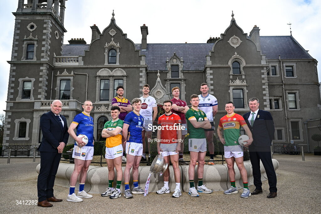 31 March 2026; Niall Grogan, AIB; and Leinster GAA Chairperson Martin Byrne with players, from left, Paddy Fox, Longford; Eoghan Nolan, Wexford; Shane Tierney, Offaly; Dean Healy, Wicklow; Kevin Feely, Kildare; Sam Mulroy, Louth; Ronan Wallace, Westmeath; Cian McBride, Meath; Killian Roche, Laois; and Mikey Bambrick, Carlow; during the launch of the 2026 Leinster GAA Senior Football Championships at Killashee Hotel in Naas, Kildare. Photo by Ramsey Cardy/Sportsfile