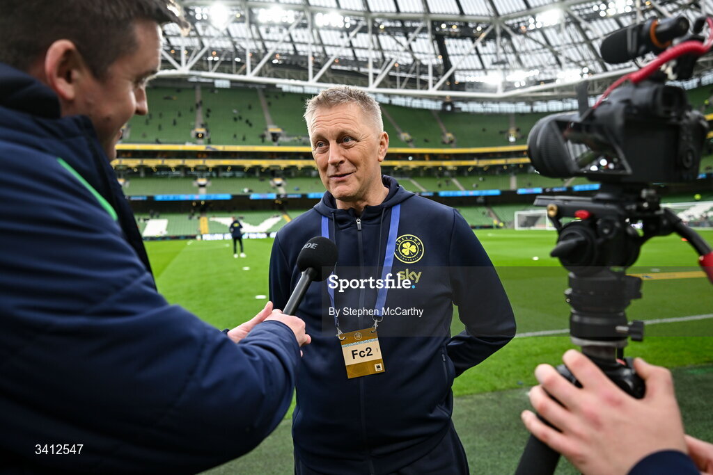 31 March 2026; Republic of Ireland head coach Heimir Hallgrimsson speaks to communications manager Kieran Crowley for FAI TV before the international friendly match between Republic of Ireland and North Macedonia at Aviva Stadium in Dublin. Photo by Stephen McCarthy/Sportsfile