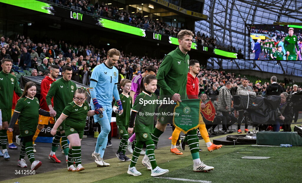 31 March 2026; Republic of Ireland captain Nathan Collins leads his side out for the international friendly match between Republic of Ireland and North Macedonia at Aviva Stadium in Dublin. Photo by Stephen McCarthy/Sportsfile