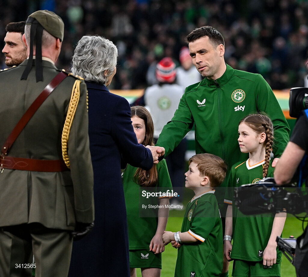 31 March 2026; Seamus Coleman of Republic of Ireland and President of Ireland Catherine Connolly before the international friendly match between Republic of Ireland and North Macedonia at Aviva Stadium in Dublin. Photo by Stephen McCarthy/Sportsfile