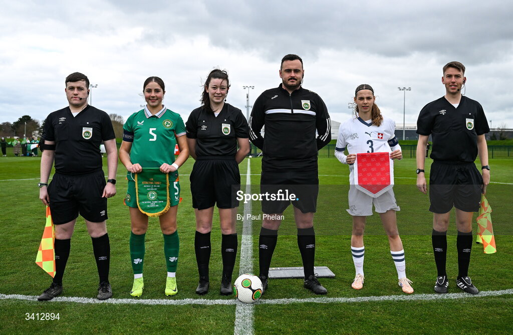 31 March 2026;  First assistant Sean Carrick, Republic of Ireland captain Lara Dailaghan, referee Grainne Hannigan,  fourth official Cal O’Donovan, Switzerland captain Louise Schülé, second assistant Zsombor Pofok before the Girls U16 international friendly match between Repubic of Ireland and Switzerland at the FAI National Training Centre in Abbotstown, Dublin. Photo by Paul Phelan/Sportsfile