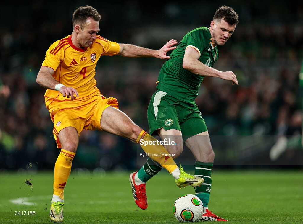 31 March 2026; Daniel Musovski of North Macedonia in action against Jason Knight of Republic of Ireland during the international friendly match between Republic of Ireland and North Macedonia at Aviva Stadium in Dublin. Photo by Thomas Flinkow/Sportsfile