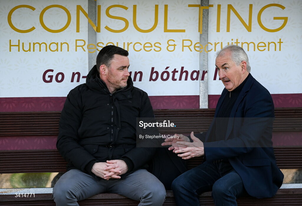 3 April 2026; Virgin Media Sport's Keith Treacy, left, and Galway United manager John Caulfield before the SSE Airtricity Men's Premier Division match between Galway United and Derry City at Eamonn Deacy Park in Galway. Photo by Stephen McCarthy/Sportsfile
