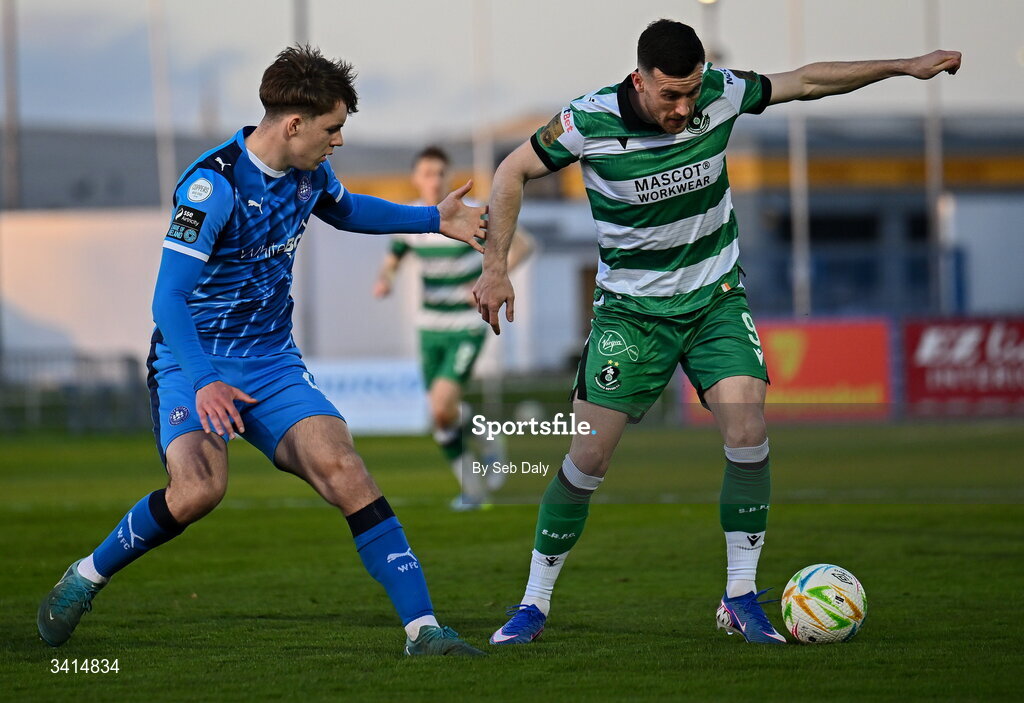 3 April 2026; Aaron Greene of Shamrock Rovers in action against Alan Zborowski of Waterford during the SSE Airtricity Men's Premier Division match between Waterford and Shamrock Rovers at the RSC in Waterford. Photo by Seb Daly/Sportsfile