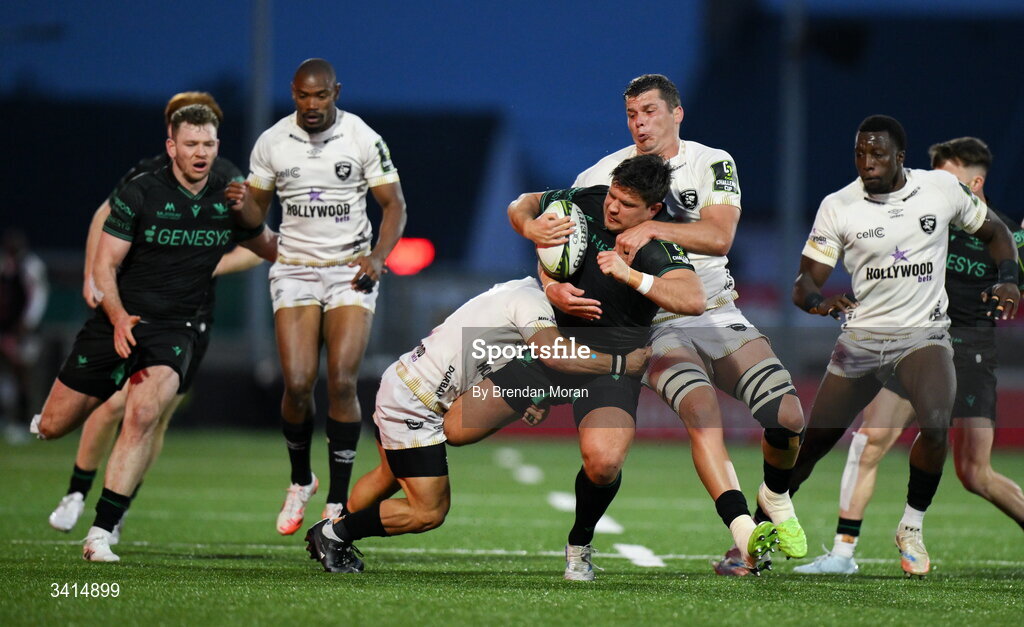 3 April 2026; Dave Heffernan of Connacht is tackled by Ross Braude and Deon Slabbert of Hollywoodbets Sharks during the EPCR Challenge Cup match between Connacht and Hollywoodbets Sharks at Dexcom Stadium in Galway. Photo by Brendan Moran/Sportsfile