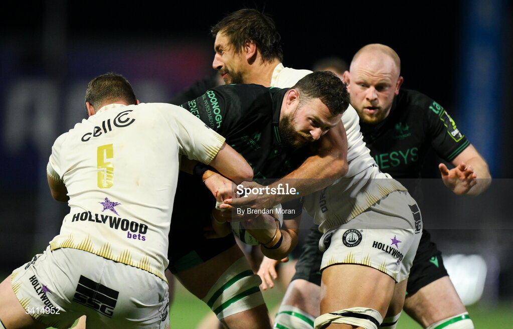 3 April 2026; Josh Murphy of Connacht is tackled by Tino Mavesere and Eben Etzebeth of Hollywoodbets Sharks during the EPCR Challenge Cup match between Connacht and Hollywoodbets Sharks at Dexcom Stadium in Galway. Photo by Brendan Moran/Sportsfile