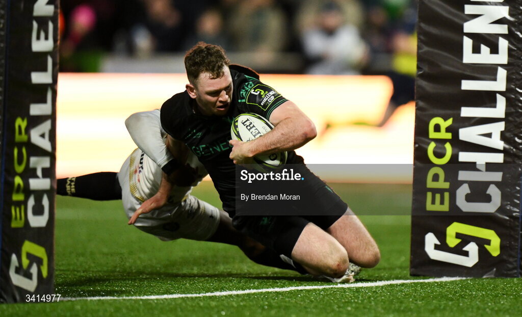 3 April 2026; Cathal Forde of Connacht scores his side's fourth try despite the tackle of Hakeem Kunene of Hollywoodbets Sharks during the EPCR Challenge Cup match between Connacht and Hollywoodbets Sharks at Dexcom Stadium in Galway. Photo by Brendan Moran/Sportsfile