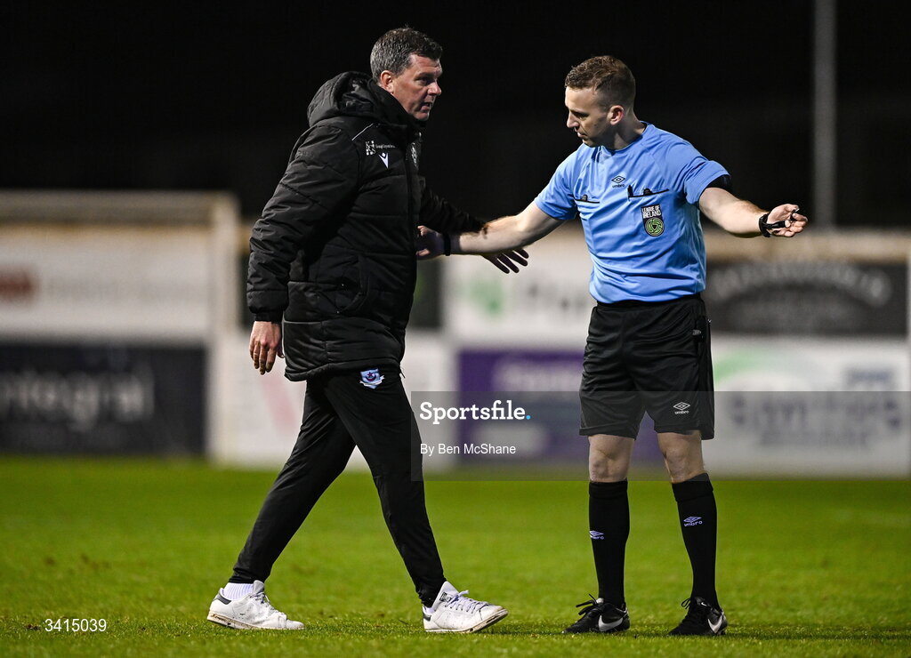 3 April 2026; Drogheda United manager Kevin Doherty in conversation with referee Paul Norton as he runs to check the well-being of Shane Farrell of Drogheda United during the SSE Airtricity Men's Premier Division match between Drogheda United and Bohemians at Sullivan & Lambe Park in Drogheda, Louth. Photo by Ben McShane/Sportsfile