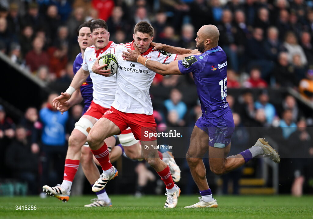 4 April 2026; Jack Crowley of Munster is tackled by Olly Woodburn of Exeter Chiefs during the EPCR Challenge Cup match between Exeter Chiefs and Munster at Sandy Park in Exeter, England. Photo by Paul Phelan/Sportsfile