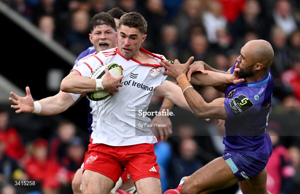 4 April 2026; Jack Crowley of Munster is tackled by Olly Woodburn of Exeter Chiefs during the EPCR Challenge Cup match between Exeter Chiefs and Munster at Sandy Park in Exeter, England. Photo by Paul Phelan/Sportsfile
