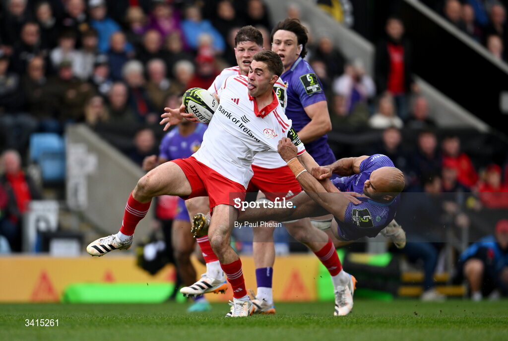 4 April 2026; Jack Crowley of Munster is tackled by Olly Woodburn of Exeter Chiefs during the EPCR Challenge Cup match between Exeter Chiefs and Munster at Sandy Park in Exeter, England. Photo by Paul Phelan/Sportsfile