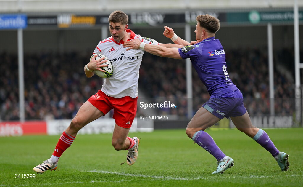 4 April 2026; Jack Crowley of Munster Rugby, despite the efforts of Steve Varney of Exeter Chiefs, on his way to scoring his side's first try during the EPCR Challenge Cup match between Exeter Chiefs and Munster at Sandy Park in Exeter, England. Photo by Paul Phelan/Sportsfile