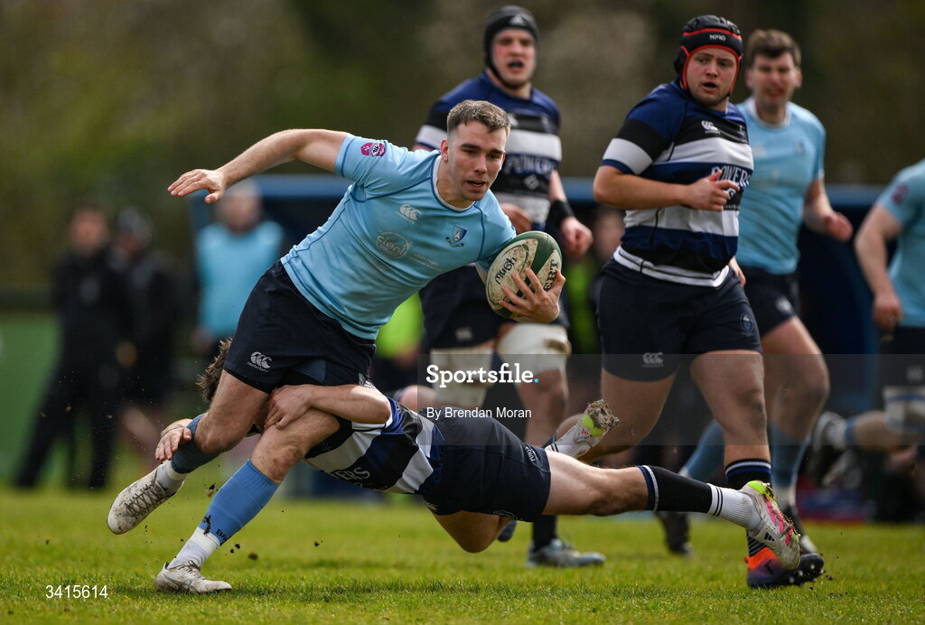 4 April 2026; Shane Mallon of MU Barnhall is tackled by Cathal McGearailt of Wanderers during the Energia Men's All-Ireland League Division match between MU Barnhall and Wanderers RFC at MU Barnhall RFC in Parsonstown, Kildare. Photo by Brendan Moran/Sportsfile