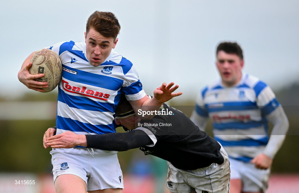 4 April 2026; Aidan Henry of Athy RFC is tackled by Mark McHugh of Longford RFC during the Bank of Ireland Provincial Towns Cup semi-final match between Athy RFC and Longford RFC at Cill Dara RFC in Silken Thomas Park in Kildare. Photo by Shauna Clinton/Sportsfile