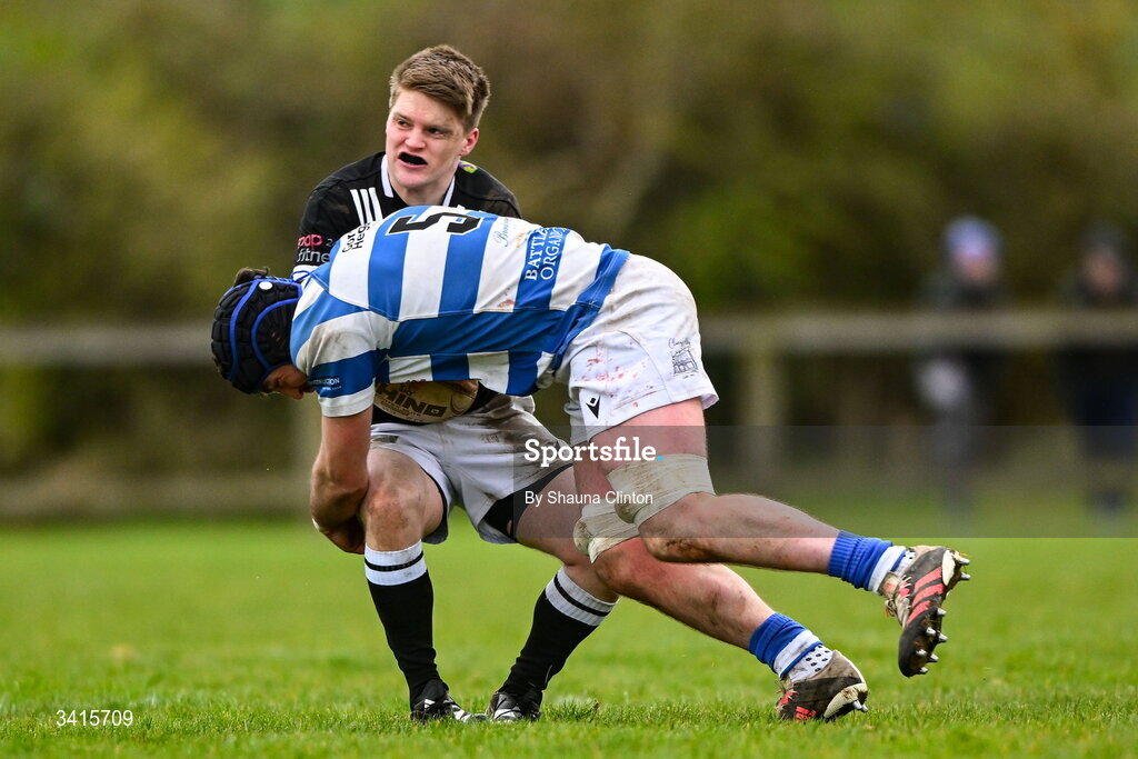 4 April 2026; David Connolly of Longford RFC is tackled by Tom Brady of Athy RFC during the Bank of Ireland Provincial Towns Cup semi-final match between Athy RFC and Longford RFC at Cill Dara RFC in Silken Thomas Park in Kildare. Photo by Shauna Clinton/Sportsfile