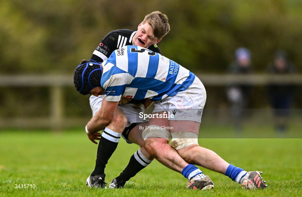 4 April 2026; David Connolly of Longford RFC is tackled by Tom Brady of Athy RFC during the Bank of Ireland Provincial Towns Cup semi-final match between Athy RFC and Longford RFC at Cill Dara RFC in Silken Thomas Park in Kildare. Photo by Shauna Clinton/Sportsfile