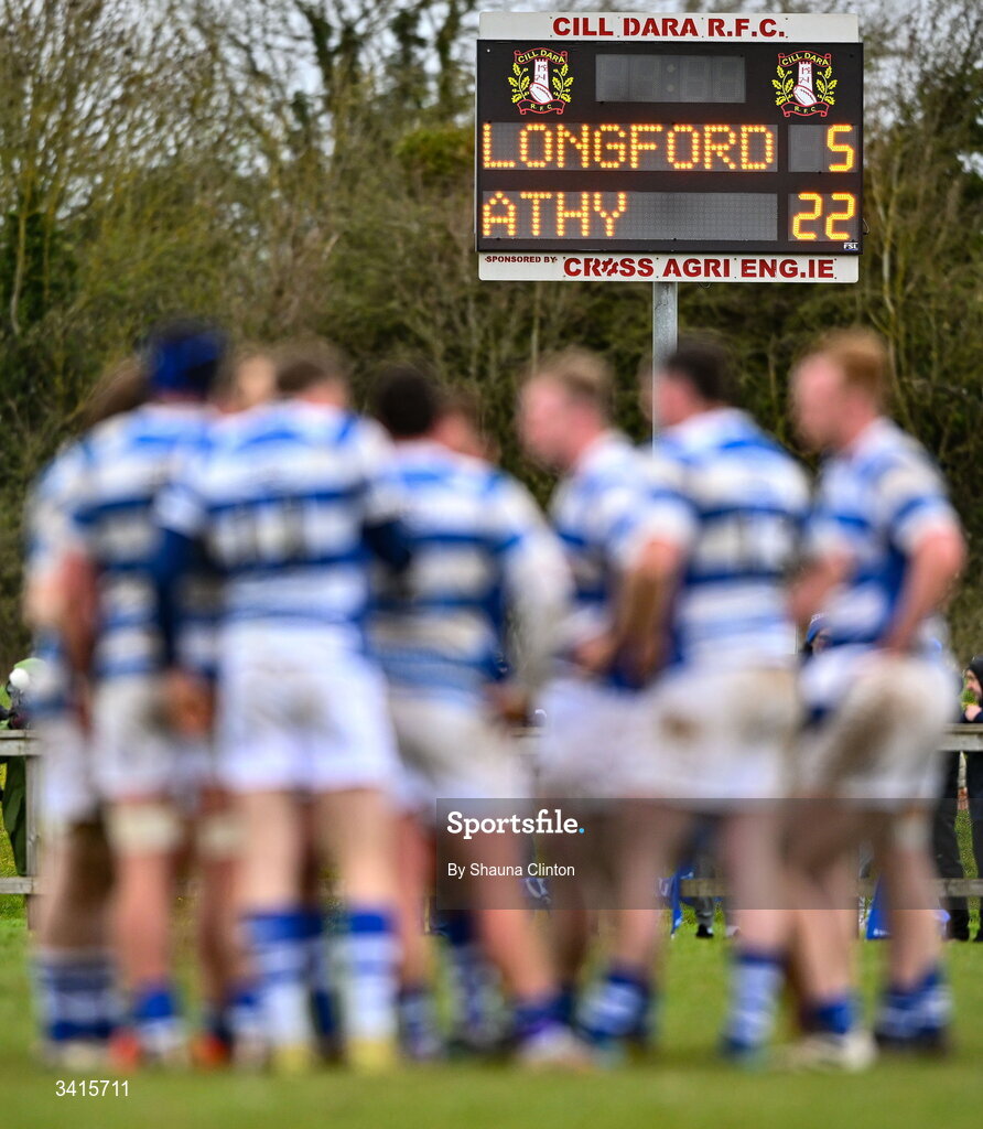 4 April 2026; A general view of the scoreboard as Athy RFC players huddle during the Bank of Ireland Provincial Towns Cup semi-final match between Athy RFC and Longford RFC at Cill Dara RFC in Silken Thomas Park in Kildare. Photo by Shauna Clinton/Sportsfile