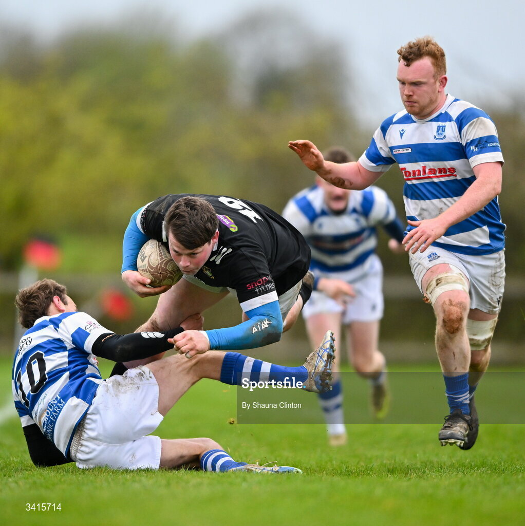 4 April 2026; Ryan McHugh of Longford RFC is tackled by Craig Millar of Athy RFC during the Bank of Ireland Provincial Towns Cup semi-final match between Athy RFC and Longford RFC at Cill Dara RFC in Silken Thomas Park in Kildare. Photo by Shauna Clinton/Sportsfile