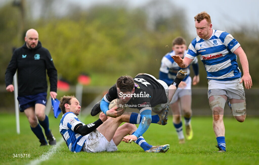 4 April 2026; Ryan McHugh of Longford RFC is tackled by Craig Millar of Athy RFC during the Bank of Ireland Provincial Towns Cup semi-final match between Athy RFC and Longford RFC at Cill Dara RFC in Silken Thomas Park in Kildare. Photo by Shauna Clinton/Sportsfile