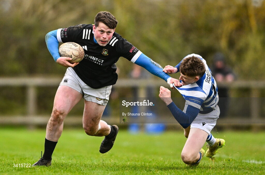 4 April 2026; Ryan McHugh of Longford RFC is tackled by Ciarán Fennessy of Athy RFC during the Bank of Ireland Provincial Towns Cup semi-final match between Athy RFC and Longford RFC at Cill Dara RFC in Silken Thomas Park in Kildare. Photo by Shauna Clinton/Sportsfile