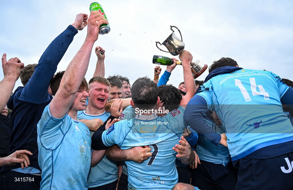 4 April 2026; MU Barnhall captain Rob Holt, 9, and teammates celebrate with the Energia AIL Division 2 trophy after the Energia Men's All-Ireland League Division match between MU Barnhall and Wanderers RFC at MU Barnhall RFC in Parsonstown, Kildare. Photo by Brendan Moran/Sportsfile