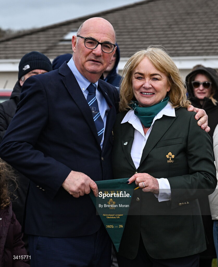 4 April 2026; MU Barnhall club president Paul Murphy is presented with the Energia AIL Division 2 pennant by IRFU committee member Grainne Carroll after the Energia Men's All-Ireland League Division match between MU Barnhall and Wanderers RFC at MU Barnhall RFC in Parsonstown, Kildare. Photo by Brendan Moran/Sportsfile