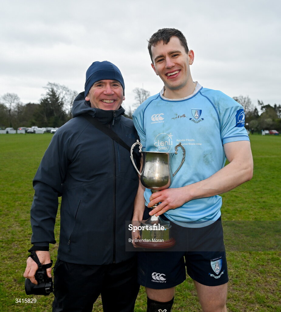 4 April 2026; David and Conor Neville of MU Barnhall celebrate with the Energia AIL Division 2 trophy after the Energia Men's All-Ireland League Division match between MU Barnhall and Wanderers RFC at MU Barnhall RFC in Parsonstown, Kildare. Photo by Brendan Moran/Sportsfile