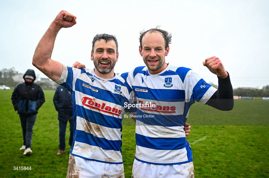 4 April 2026; Athy RFC players Eoin Farrell, left, and Craig Millar celebrate after their side's victory in the Bank of Ireland Provincial Towns Cup semi-final match between Athy RFC and Longford RFC at Cill Dara RFC in Silken Thomas Park in Kildare. Photo by Shauna Clinton/Sportsfile