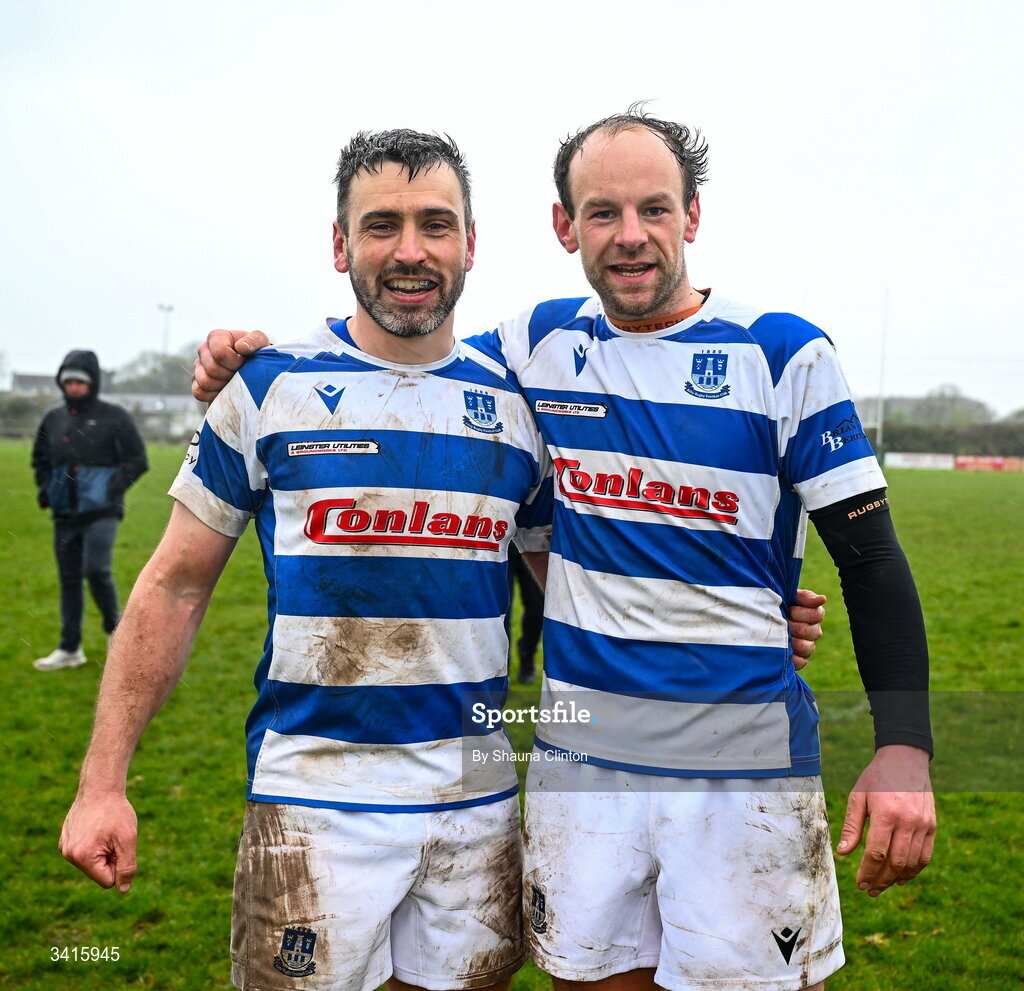 4 April 2026; Athy RFC players Eoin Farrell, left, and Craig Millar celebrate after their side's victory in the Bank of Ireland Provincial Towns Cup semi-final match between Athy RFC and Longford RFC at Cill Dara RFC in Silken Thomas Park in Kildare. Photo by Shauna Clinton/Sportsfile