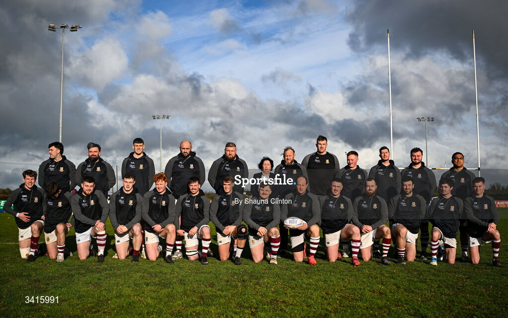4 April 2026; Tullow RFC president Mary O'Neill joins the Tullow RFC squad for a team photograph ahead of the Bank of Ireland Provincial Towns Cup semi-final match between Naas RFC and Tullow RFC at County Carlow RFC in Oakpark, Carlow. Photo by Shauna Clinton/Sportsfile