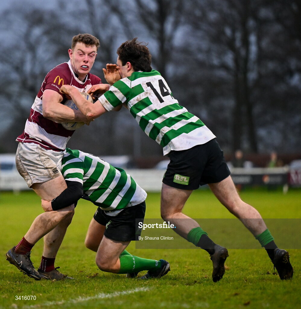 4 April 2026; Adam Johnson of Tullow RFC is tackled by David O'Sullivan of Naas RFC during the Bank of Ireland Provincial Towns Cup semi-final match between Naas RFC and Tullow RFC at County Carlow RFC in Oakpark, Carlow. Photo by Shauna Clinton/Sportsfile