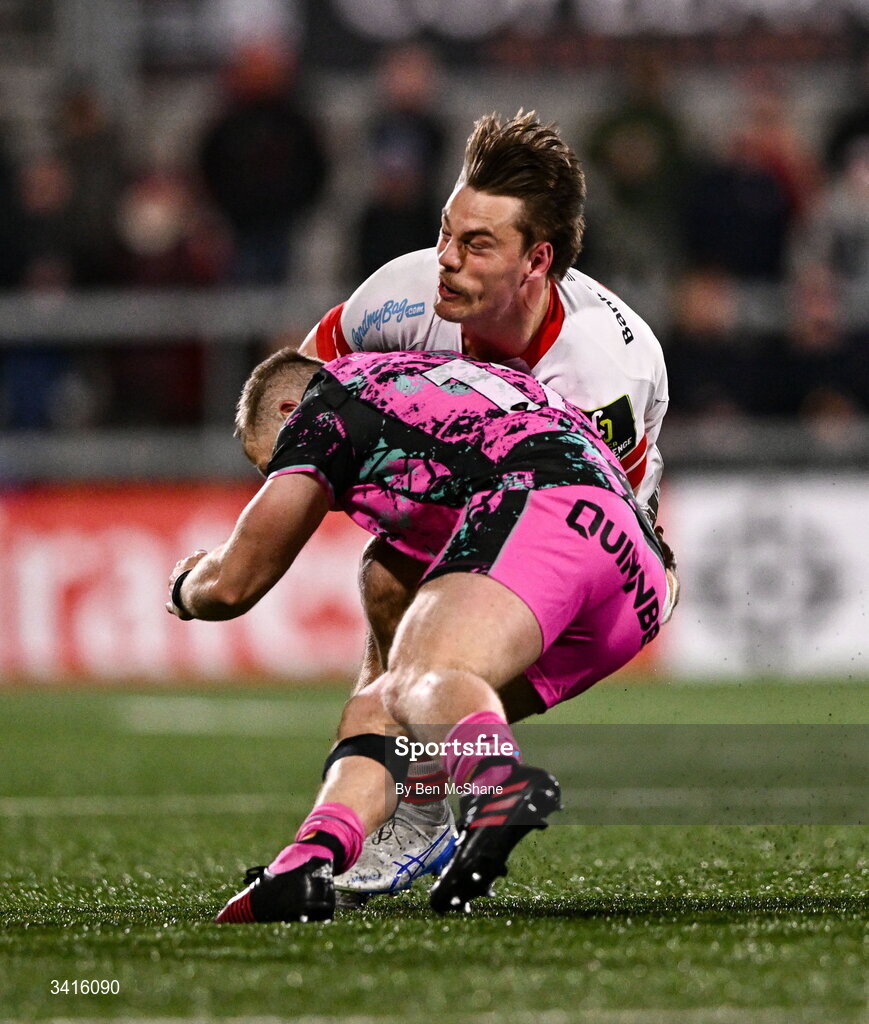 4 April 2026; Ethan McIlroy of Ulster is tackled by Keiran Williams of Ospreys during the EPCR Challenge Cup match between Ulster and Ospreys at Affidea Stadium in Belfast. Photo by Ben McShane/Sportsfile