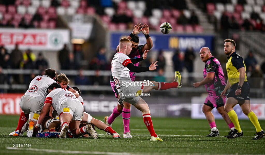 4 April 2026; Nathan Doak of Ulster has a kick chased down by Rhys Davies of Ospreys during the EPCR Challenge Cup match between Ulster and Ospreys at Affidea Stadium in Belfast. Photo by Ben McShane/Sportsfile
