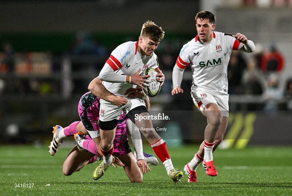 4 April 2026; Jake Flannery of Ulster is tackled by Owen Watkin of Ospreys during the EPCR Challenge Cup match between Ulster and Ospreys at Affidea Stadium in Belfast. Photo by Ramsey Cardy/Sportsfile