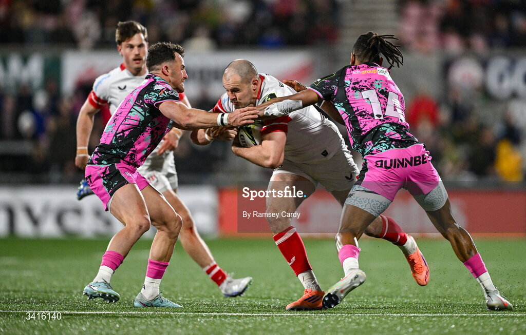 4 April 2026; Jacob Stockdale of Ulster is tackled by Luke Morgan, left, and Daniel Kasende of Ospreys during the EPCR Challenge Cup match between Ulster and Ospreys at Affidea Stadium in Belfast. Photo by Ramsey Cardy/Sportsfile