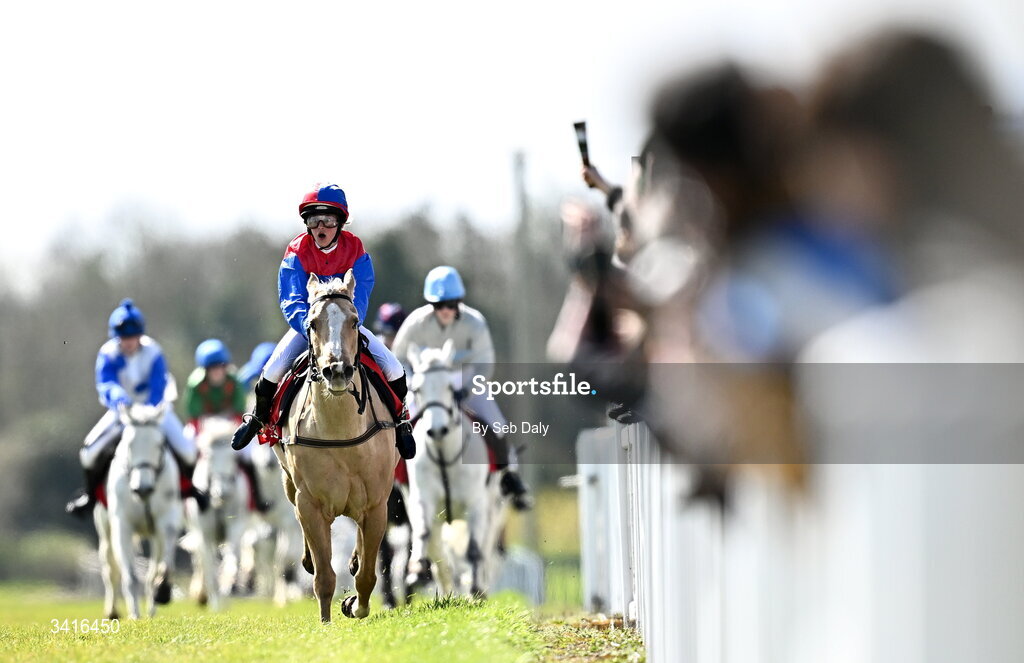 5 April 2026; Jockey Erin Sweeney, from Laois, reacts as she approaches the finish line to win the Connolly's Red Mills Pony Club Exhibition Race on Cisco Sweet during day two of the Fairyhouse Easter Festival at Fairyhouse Racecourse in Ratoath, Meath. Photo by Seb Daly/Sportsfile