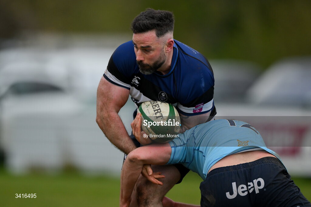 4 April 2026; Mick McGrath of Wanderers is tackled by Jack Hannon of MU Barnhall during the Energia Men's All-Ireland League Division match between MU Barnhall and Wanderers RFC at MU Barnhall RFC in Parsonstown, Kildare. Photo by Brendan Moran/Sportsfile