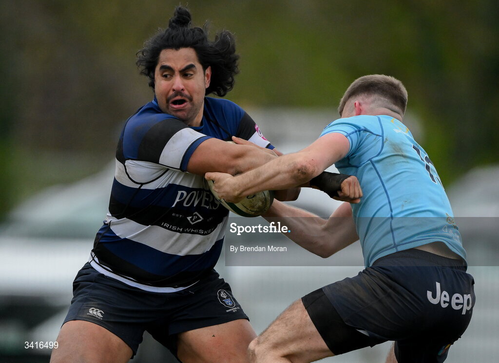 4 April 2026; Deon Mau'u of Wanderers is tackled by Shane Mallon of MU Barnhall during the Energia Men's All-Ireland League Division match between MU Barnhall and Wanderers RFC at MU Barnhall RFC in Parsonstown, Kildare. Photo by Brendan Moran/Sportsfile