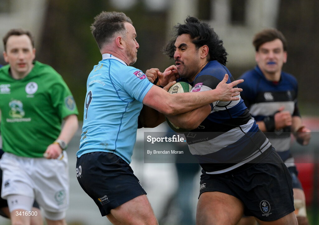 4 April 2026; Deon Mau'u of Wanderers is tackled by Rob Holt of MU Barnhall during the Energia Men's All-Ireland League Division match between MU Barnhall and Wanderers RFC at MU Barnhall RFC in Parsonstown, Kildare. Photo by Brendan Moran/Sportsfile