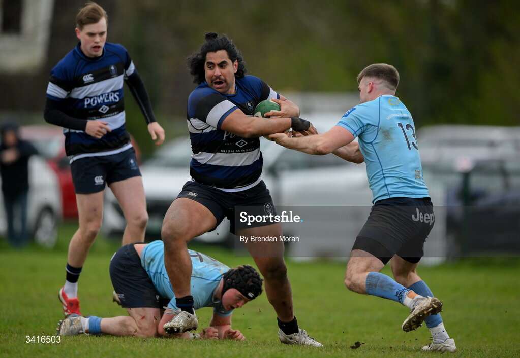 4 April 2026; Deon Mau'u of Wanderers is tackled by Shane Mallon of MU Barnhall during the Energia Men's All-Ireland League Division match between MU Barnhall and Wanderers RFC at MU Barnhall RFC in Parsonstown, Kildare. Photo by Brendan Moran/Sportsfile