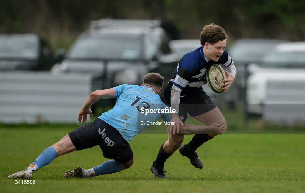 4 April 2026; Louis McDonagh of Wanderers is tackled by Shane Mallon of MU Barnhall during the Energia Men's All-Ireland League Division match between MU Barnhall and Wanderers RFC at MU Barnhall RFC in Parsonstown, Kildare. Photo by Brendan Moran/Sportsfile
