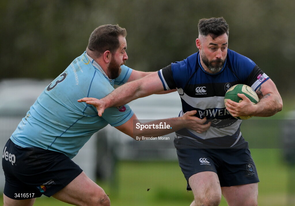 4 April 2026; Mick McGrath of Wanderers is tackled by Darragh Bellanova of MU Barnhall during the Energia Men's All-Ireland League Division match between MU Barnhall and Wanderers RFC at MU Barnhall RFC in Parsonstown, Kildare. Photo by Brendan Moran/Sportsfile