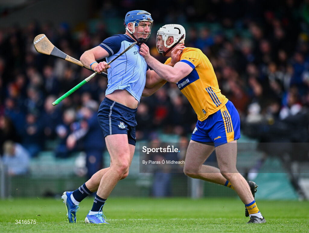 5 April 2026; John Hetherton of Dublin and Conor Cleary of Clare tussle off the ball during the Allianz Hurling League Division 1B final match between Clare and Dublin at TUS Gaelic Grounds in Limerick. Photo by Piaras Ó Mídheach/Sportsfile