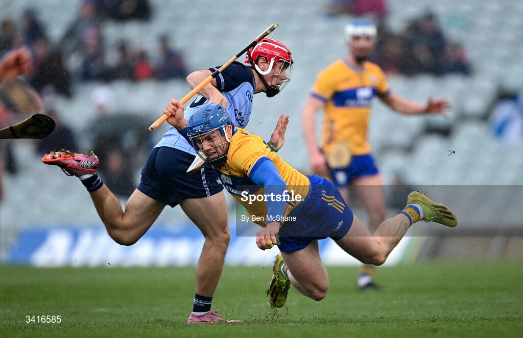 5 April 2026; Shane O'Donnell of Clare is tackled by Conor Groarke of Dublin during the Allianz Hurling League Division 1B final match between Clare and Dublin at TUS Gaelic Grounds in Limerick. Photo by Ben McShane/Sportsfile