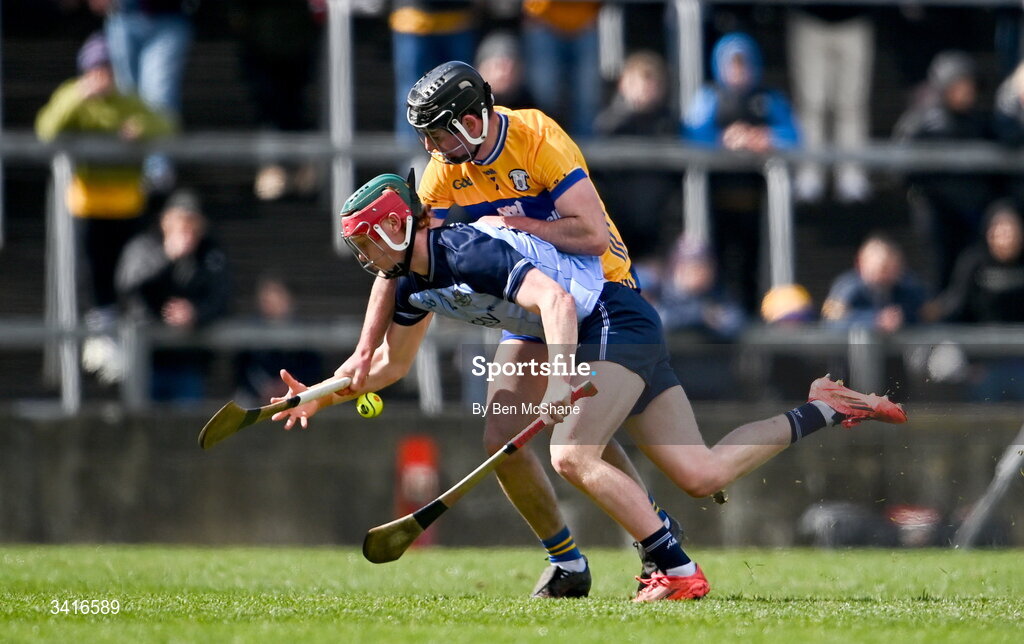 5 April 2026; Diarmuid Ó Dúlaing of Dublin is tackled by Cathal Malone of Clare during the Allianz Hurling League Division 1B final match between Clare and Dublin at TUS Gaelic Grounds in Limerick. Photo by Ben McShane/Sportsfile
