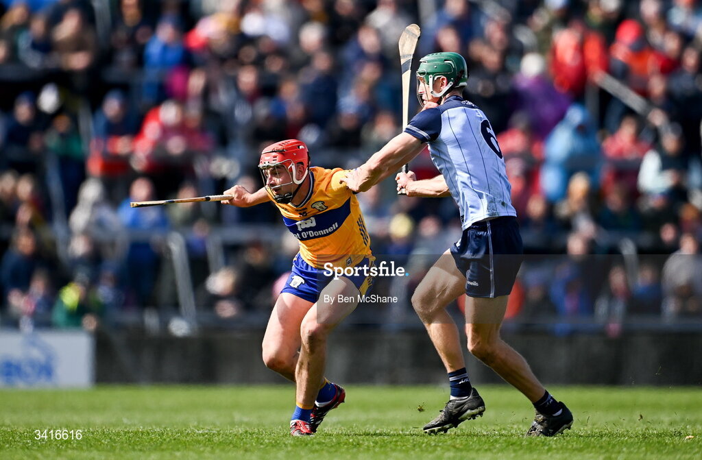 5 April 2026; Peter Duggan of Clare is tackled by Chris Crummey of Dublin during the Allianz Hurling League Division 1B final match between Clare and Dublin at TUS Gaelic Grounds in Limerick. Photo by Ben McShane/Sportsfile